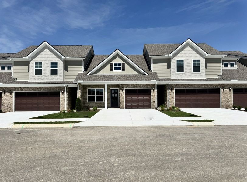 Front exterior of a new home in Park Place, Shelbyville, TN, highlighting curb appeal (Image 9).