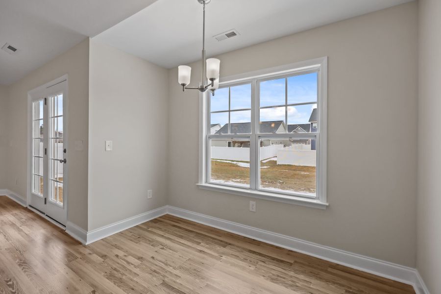 Representative unfurnished interior of a home built from the Hardy by Bill Clark Homes in Laurel Oaks, Greenville (Image 25).