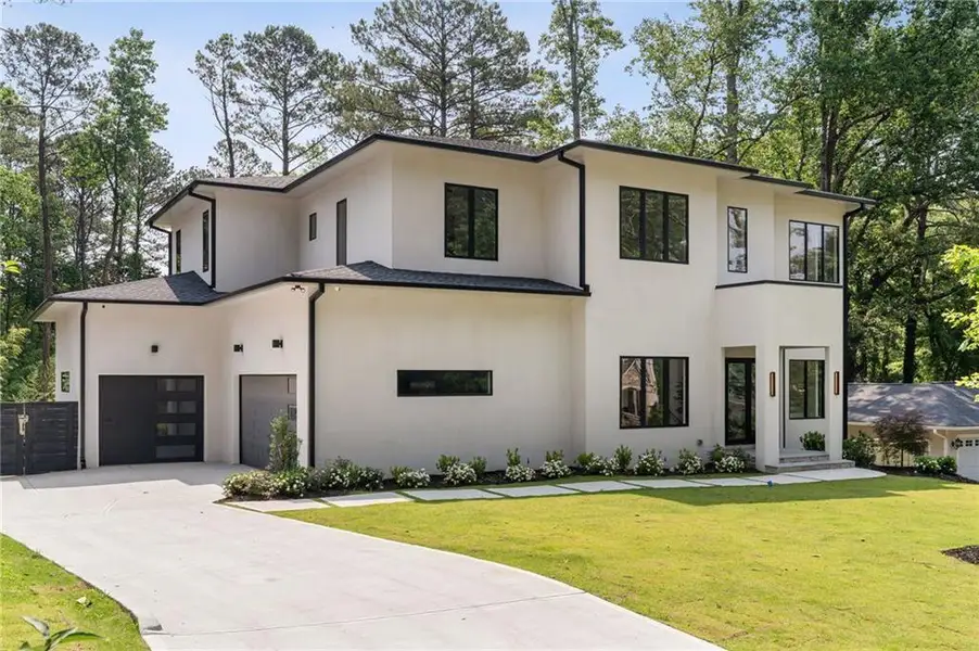 Front exterior of a new home in , Atlanta, GA, highlighting curb appeal (Image 1). Front exterior of a new home in , Atlanta, GA, highlighting curb appeal (Image 1).