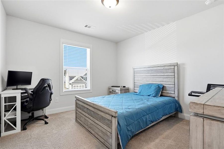 Furnished interior view inside a new home in Calgary Downs, Winder (Image 11).