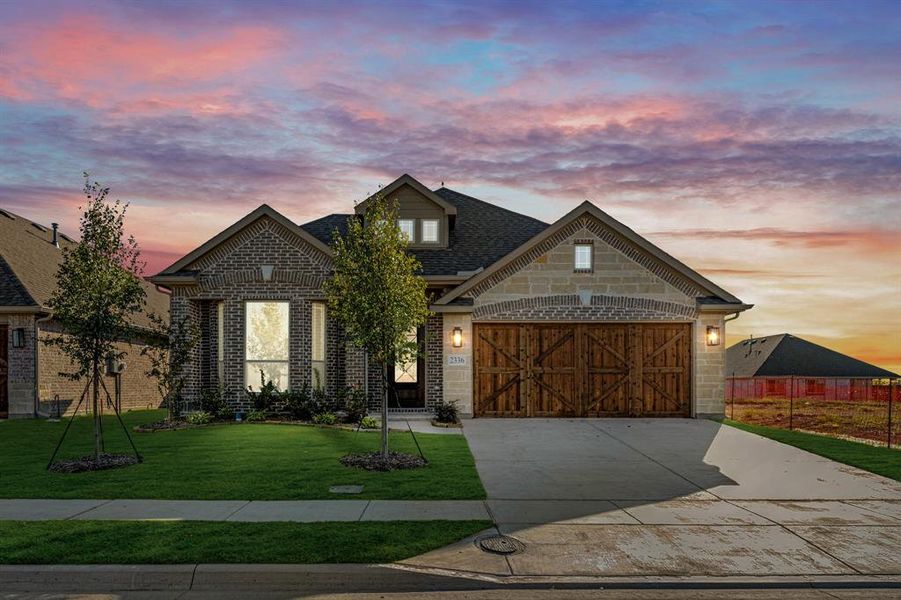 Front exterior of a new home in Stone River Glen 50s, Royse City, TX, highlighting curb appeal (Image 24). Front exterior of a new home in Stone River Glen 50s, Royse City, TX, highlighting curb appeal (Image 24).