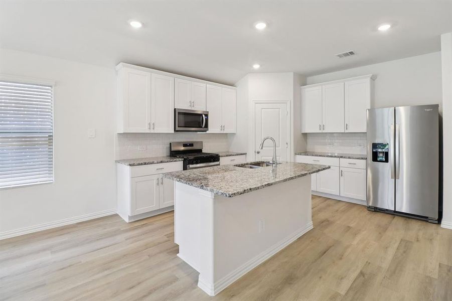 Photo is not of the actual home, but is an inspirational photo of builder’s model home and may depict options, furnishings, and/or decorator features that are not included.