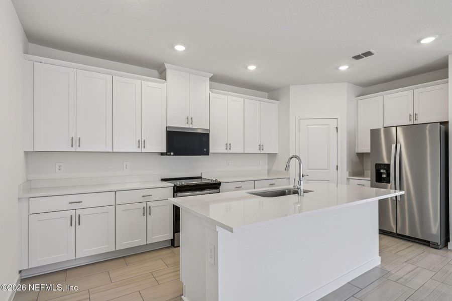 Furnished interior view inside a new home in Colbert Landings, Palm Coast (Image 7).