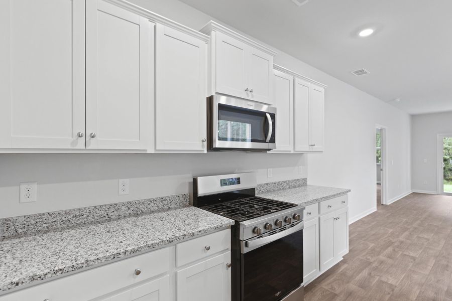 Furnished interior view inside a new home in Pine Hills at Cane Bay, Summerville (Image 5).