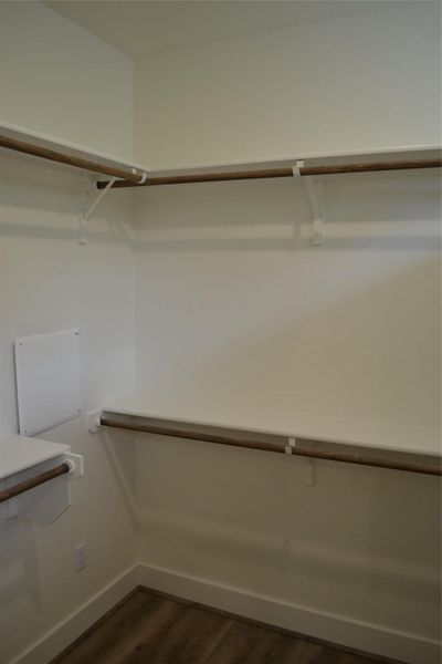 Large Walk-In Primary Closet w/ Home Technology Center