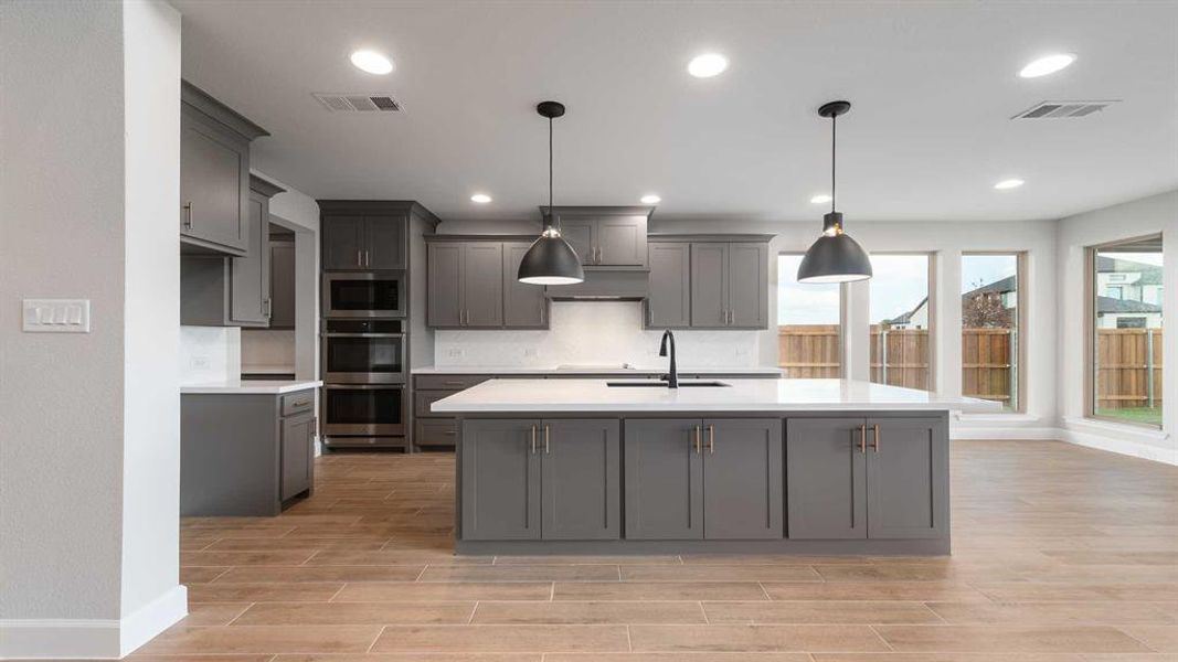 Furnished interior view inside a new home in Terraces 72', Rockwall (Image 6).