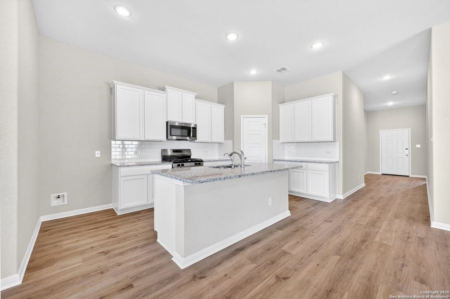 Furnished interior view inside a new home in Winding Brook, San Antonio (Image 10).