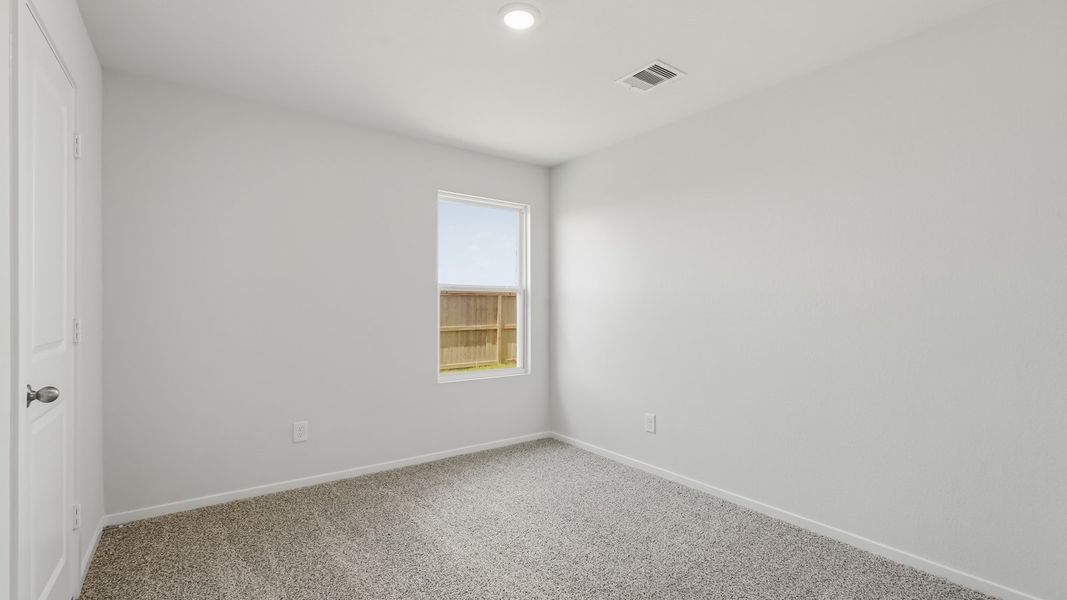 Spacious, unfurnished interior of a new home in Sunterra, Katy (Image 19).