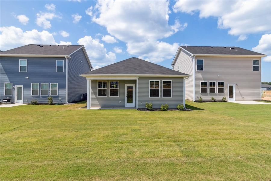 Front exterior of a new home in Windsor, North Augusta, SC, highlighting curb appeal (Image 19). Front exterior of a new home in Windsor, North Augusta, SC, highlighting curb appeal (Image 19).