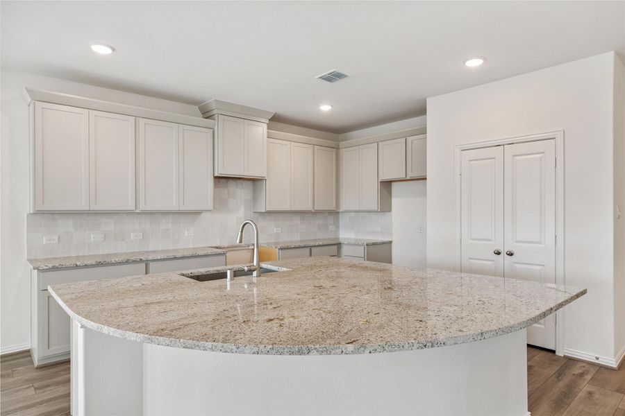 Furnished interior view inside a new home in Aldeana, Bonney (Image 10).