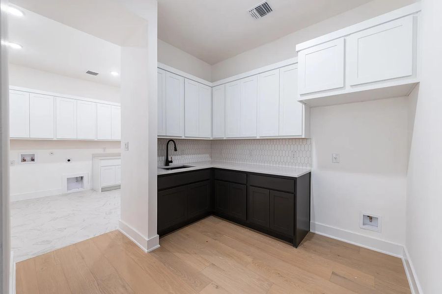 Furnished interior view inside a new home in Caliterra - 110', Dripping Springs (Image 10). Furnished interior view inside a new home in Caliterra - 110', Dripping Springs (Image 10).