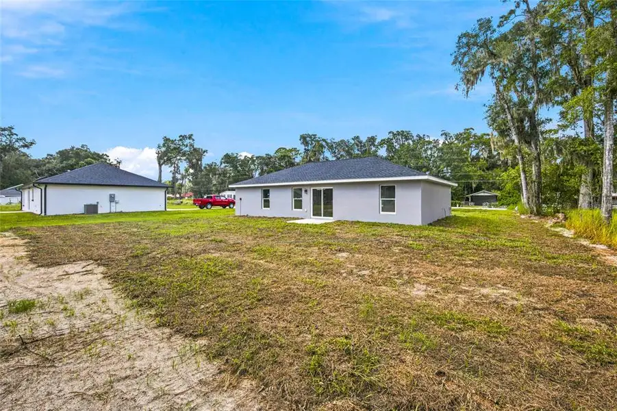 Exterior details and patio area of a home in , Ocala (Image 17).