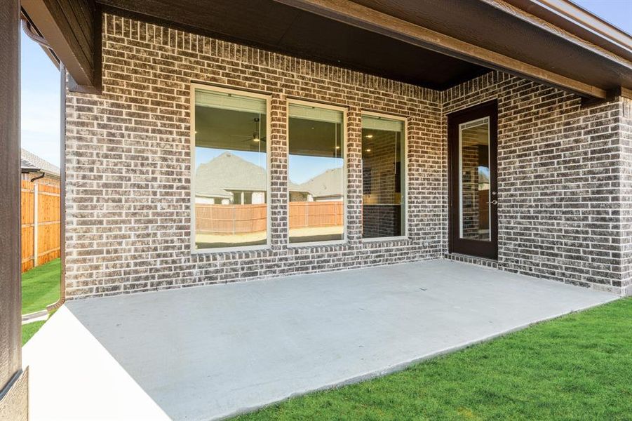 Exterior details and patio area of a home in Timberbrook, Justin (Image 4).