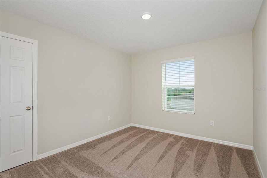 Spacious, unfurnished interior of a new home in Scenic Terrace, Haines City (Image 20).