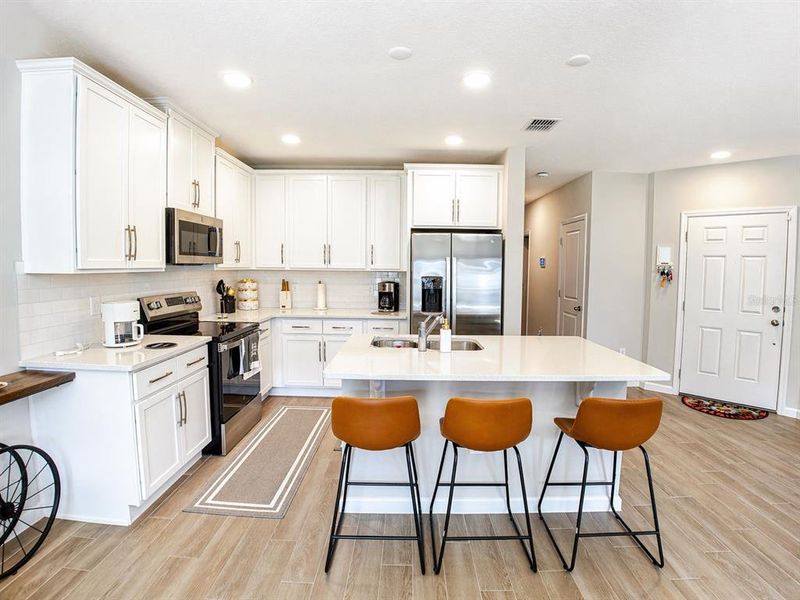 Furnished interior view inside a new home in , St. Cloud (Image 8).