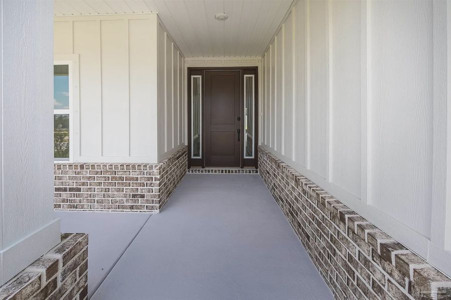 Exterior details and patio area of a home in Parkland Place, Pace (Image 3).