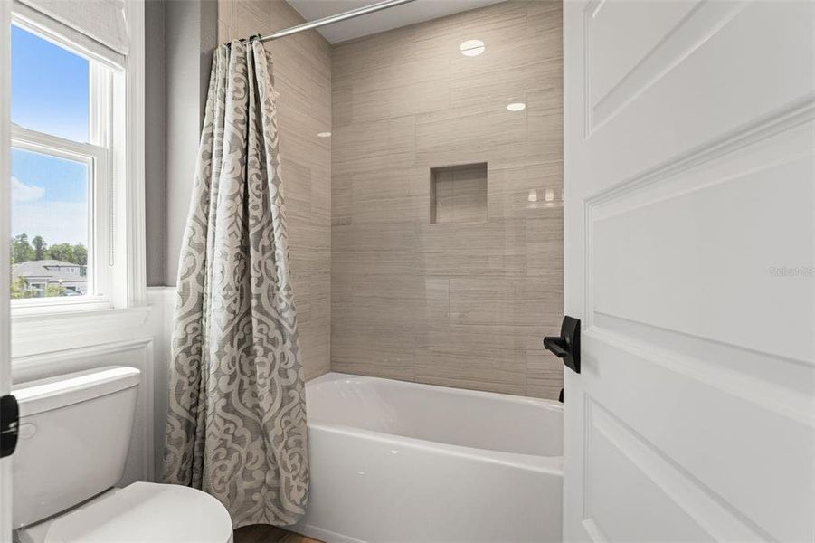 Furnished interior view inside a new home in Whispering Oaks Preserve, Wesley Chapel (Image 36).