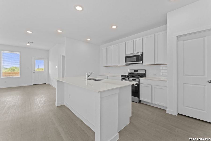 Furnished interior view inside a new home in Espada, San Antonio (Image 4).