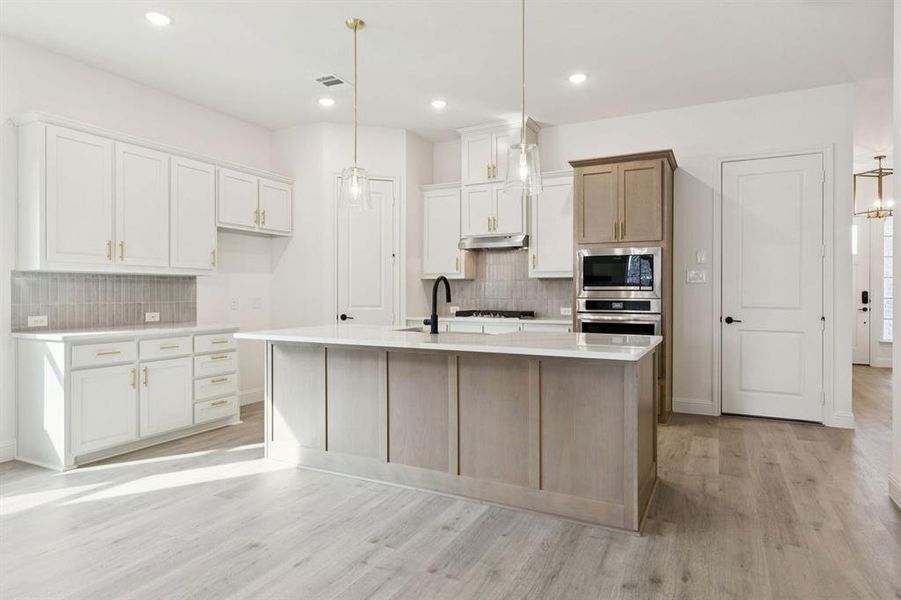 Furnished interior view inside a new home in Country Lakes, Denton (Image 10).