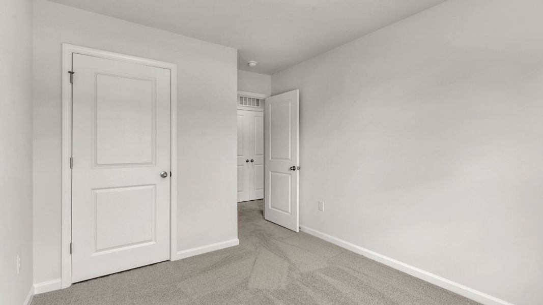 Spacious, unfurnished interior of a new home in The Townes at Wilson's Ridge, Smithfield (Image 26).