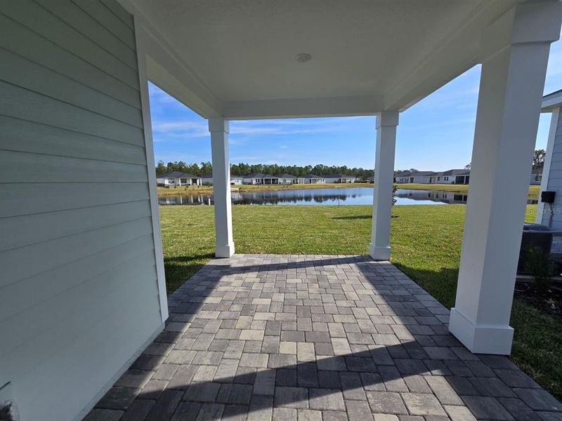Exterior details and patio area of a home in Colbert Landings, Palm Coast (Image 4).