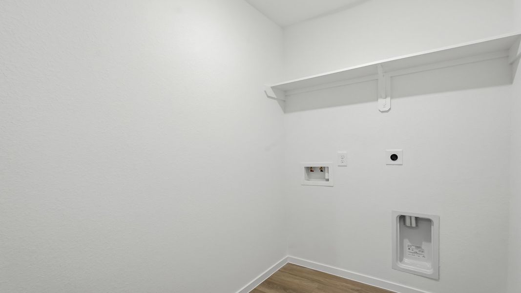 Spacious, unfurnished interior of a new home in Sunterra, Katy (Image 22).