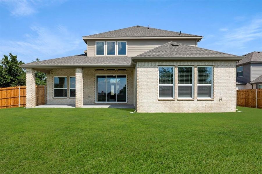 Front exterior of a new home in Woodcreek, Rockwall, TX, highlighting curb appeal (Image 23).