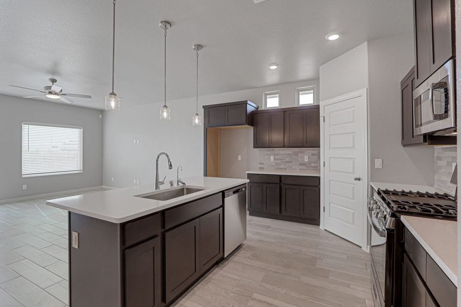 Furnished interior view inside a new home in Emerald Estates, Horizon City (Image 11).