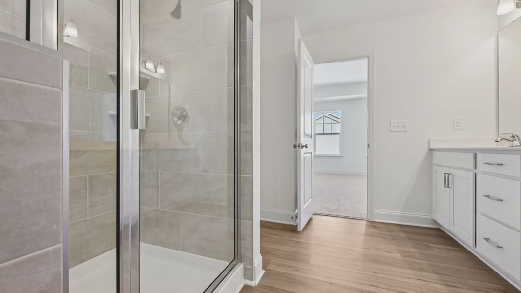 Furnished interior view inside a new home in Sidney Creek Single Family, Zebulon (Image 54).