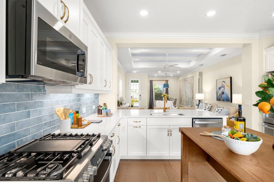 Representative furnished interior of a home built from the Liberty 4 by Neal Communities in Palmera, Venice (Image 11).