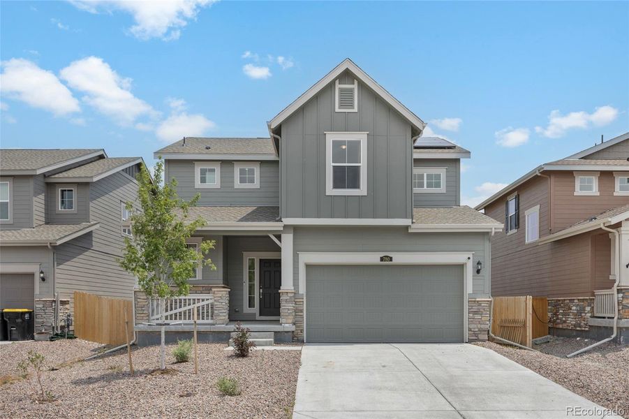 Front exterior of a new home in , Elizabeth, CO, highlighting curb appeal (Image 22).