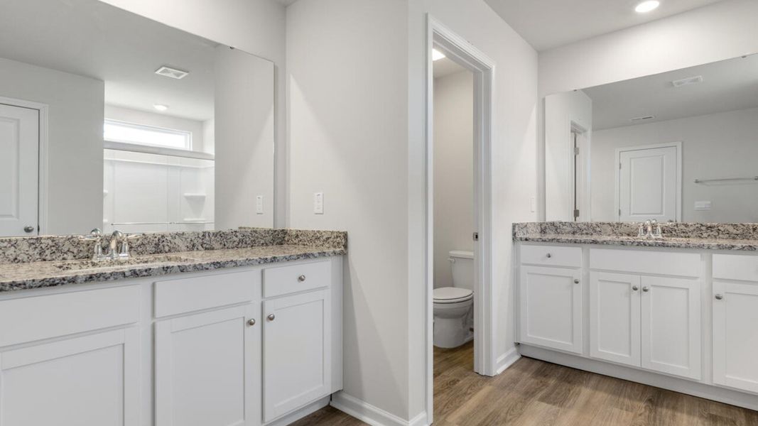 Representative furnished interior of a home built from the HARBOR OAK by D.R. Horton in Indigo Preserve, Leland (Image 14).