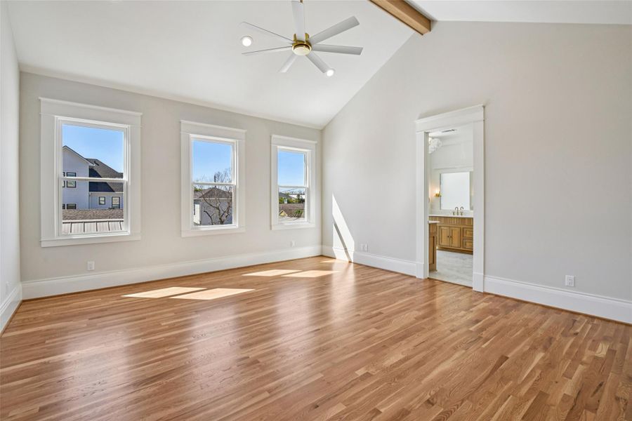 The primary bedroom has vaulted ceilings. The primary bedroom has vaulted ceilings.