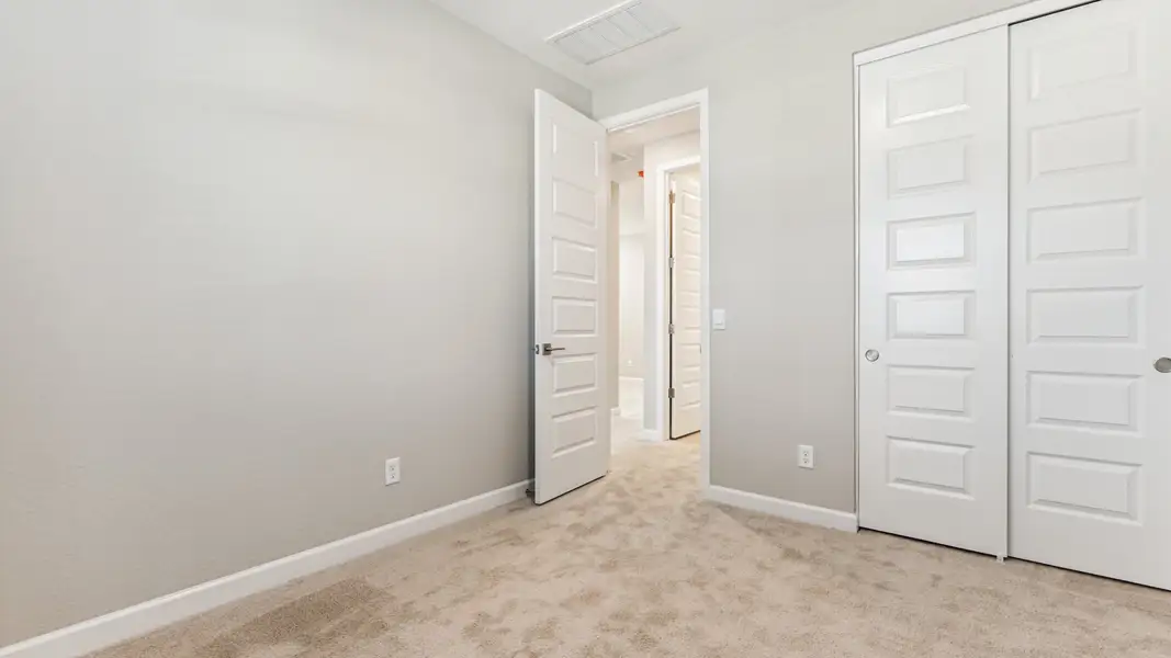 Spacious, unfurnished interior of a new home in Talinn Towns at Desert Ridge, Phoenix (Image 29).