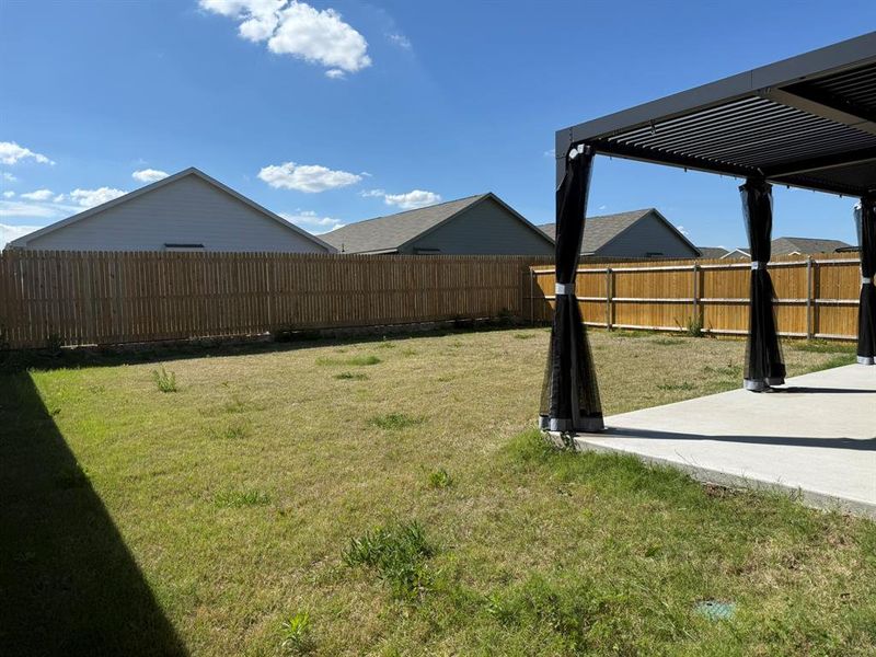 Exterior details and patio area of a home in Tillage Farms, Princeton (Image 4).