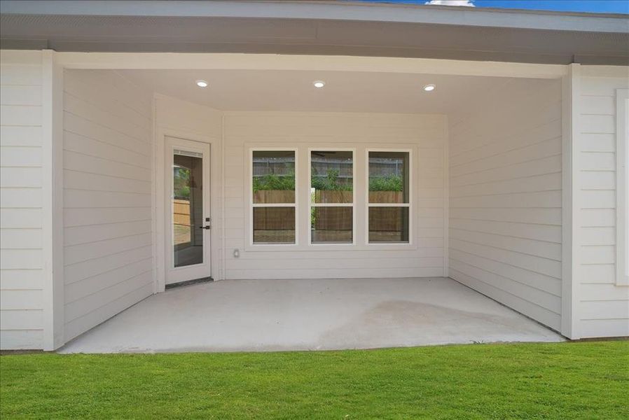Covered patio with recessed lighting, concrete flooring, and direct outdoor access Covered patio with recessed lighting, concrete flooring, and direct outdoor access