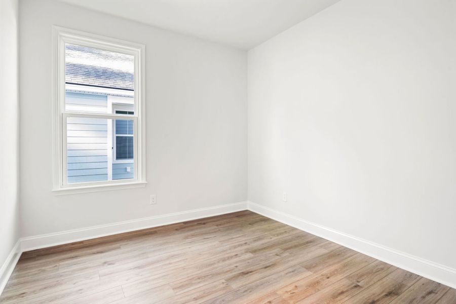 Spacious, unfurnished interior of a new home in Sun City Hilton Head, Bluffton (Image 29).