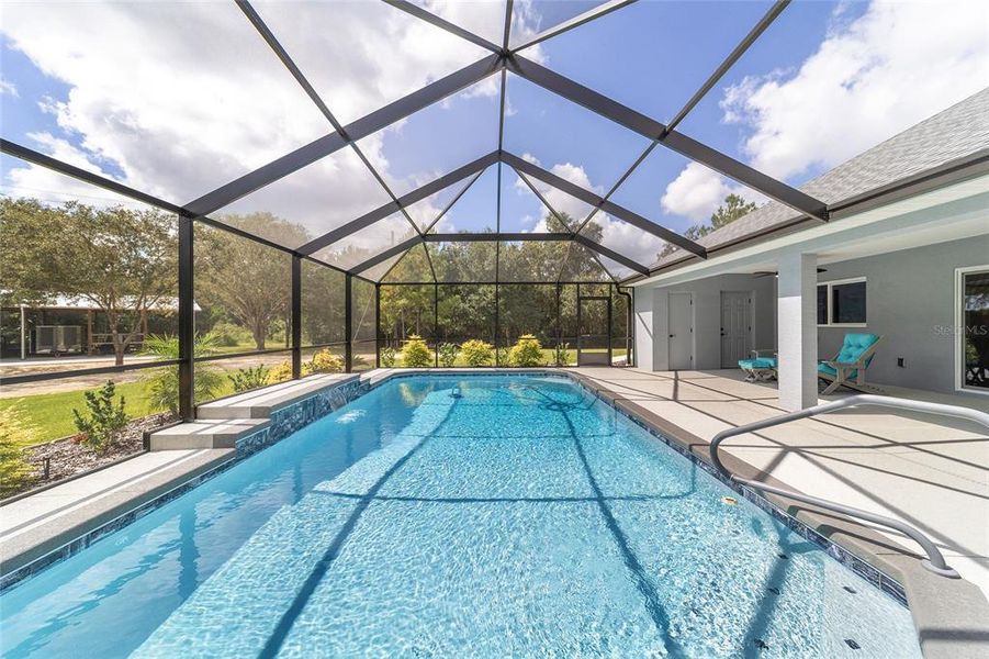 Exterior details and patio area of a home in , Williston (Image 31).
