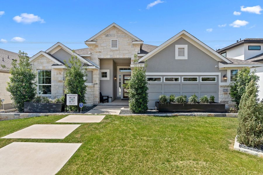 Front exterior of a new home in Esperanza – New Phase Now Selling, Boerne, TX, highlighting curb appeal (Image 20). Front exterior of a new home in Esperanza – New Phase Now Selling, Boerne, TX, highlighting curb appeal (Image 20).