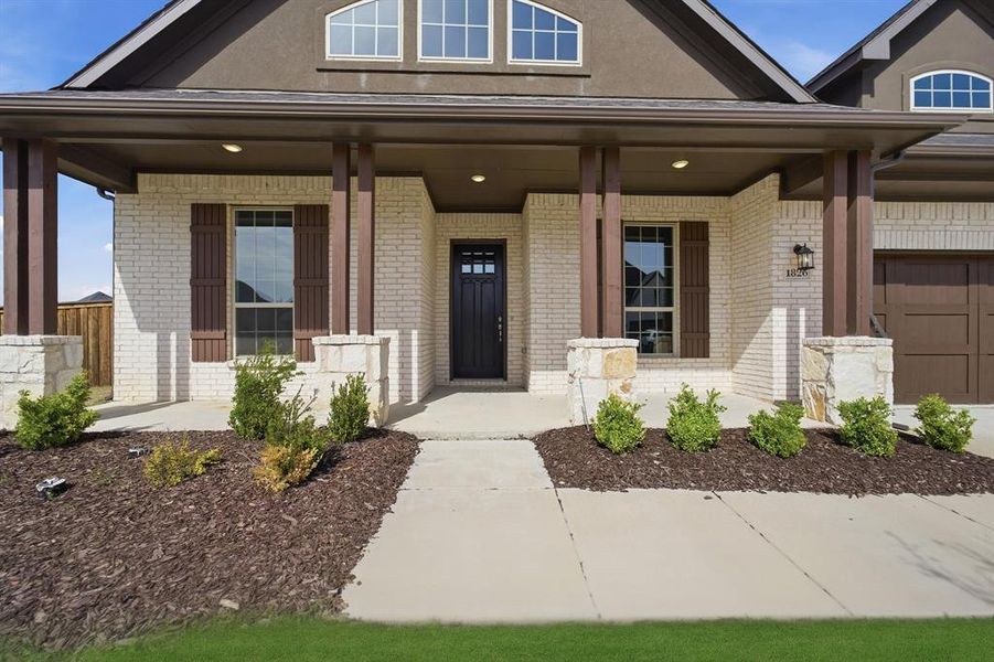 Exterior details and patio area of a home in Sonoma Verde, Rockwall (Image 23). Exterior details and patio area of a home in Sonoma Verde, Rockwall (Image 23).