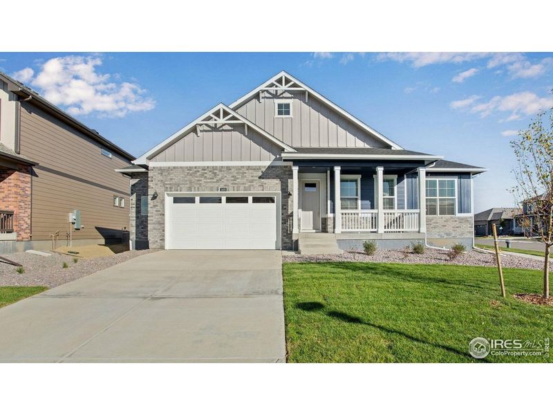 Front exterior of a new home in Vantage, Berthoud, CO, highlighting curb appeal (Image 2).