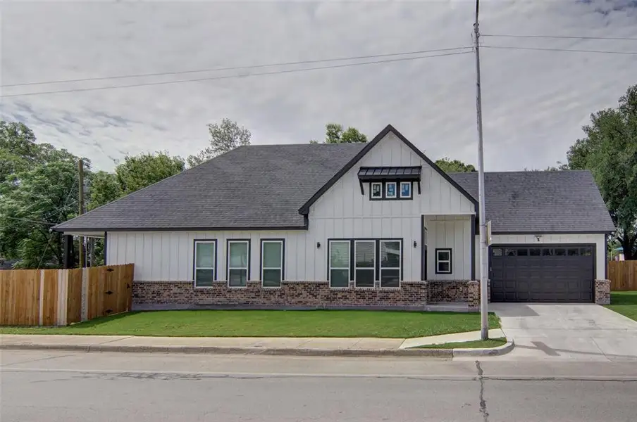 Front exterior of a new home in , Fort Worth, TX, highlighting curb appeal (Image 25). Front exterior of a new home in , Fort Worth, TX, highlighting curb appeal (Image 25).