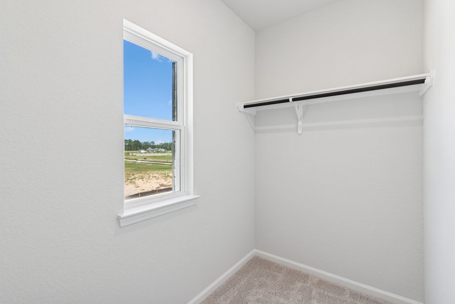 The Oriole II- Primary Bedroom Walk-in Closet 2. Sample image to be used for example only, colors, options and upgrades vary.