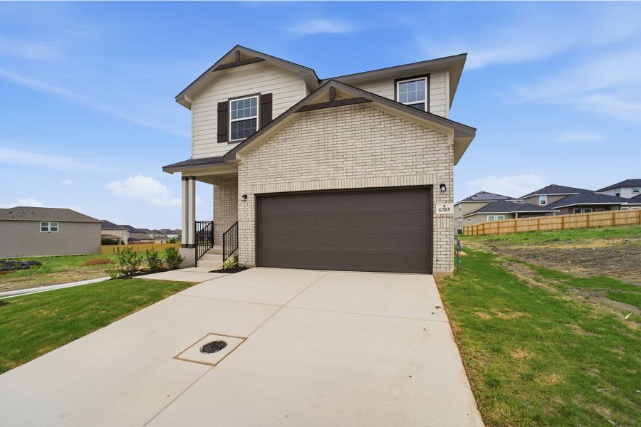 Front exterior of a new home in Willow View, Converse, TX, highlighting curb appeal (Image 28).