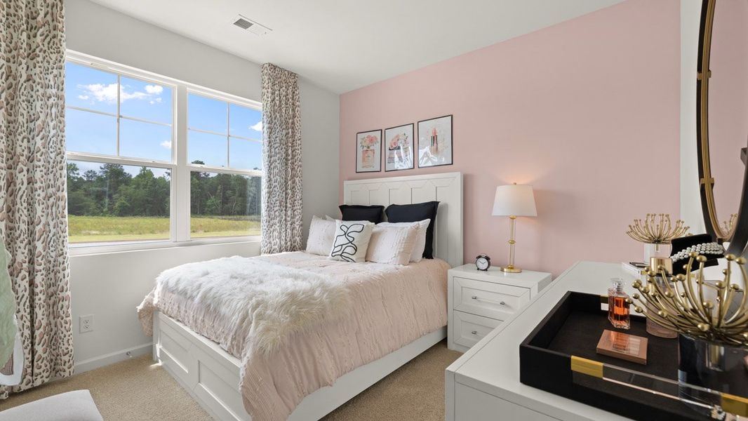 Representative furnished interior of a home built from the Cali by D.R. Horton in Champion's Run, Lithonia (Image 15).