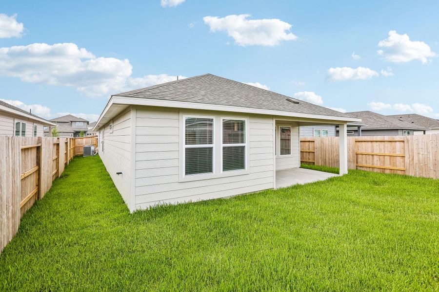 Exterior details and patio area of a home in Riviera Pines - Traditional Series, Conroe (Image 21).