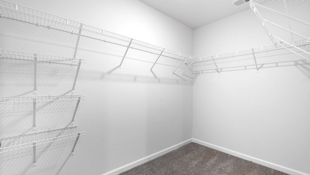 Representative unfurnished interior of a home built from the BELHAVEN by D.R. Horton in Benjamin's Grove, Woodruff (Image 29).