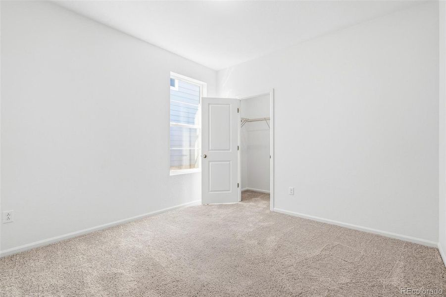 Spacious, unfurnished interior of a new home in Legato, Commerce City (Image 28).