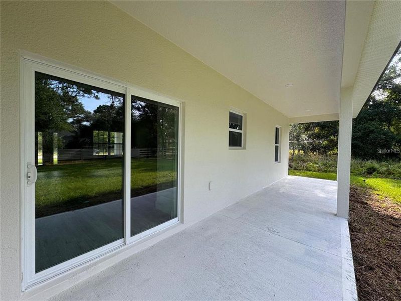 Exterior details and patio area of a home in , Citrus Springs (Image 18).