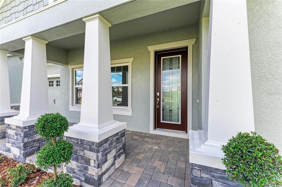 Exterior details and patio area of a home in Creek Ridge Preserve, Lithia (Image 2).